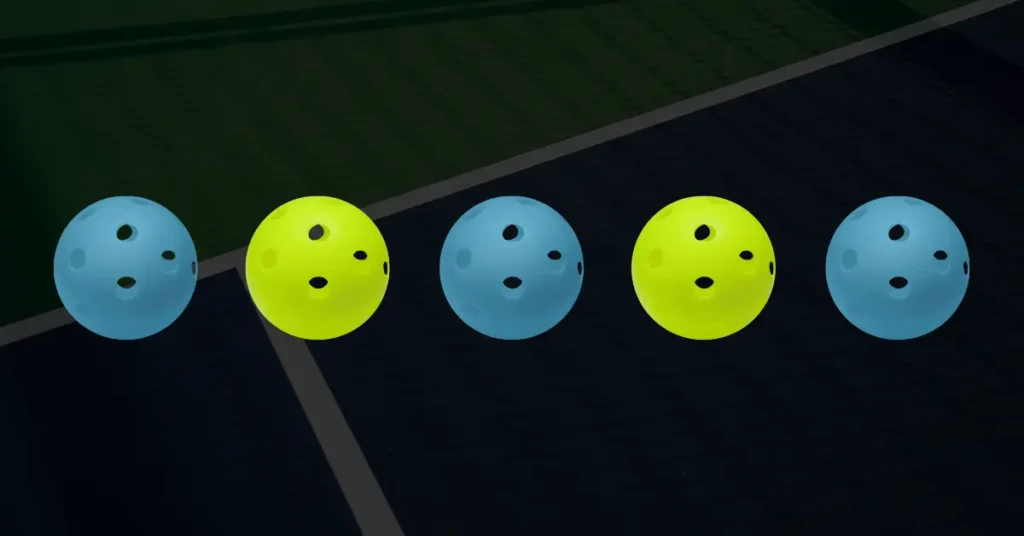 Blue and yellow pickleballs
